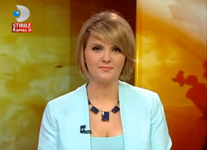 Romanian TV Channel "Stirile Kanal d" News Reporter. Photogrpah courtesy of YouTube